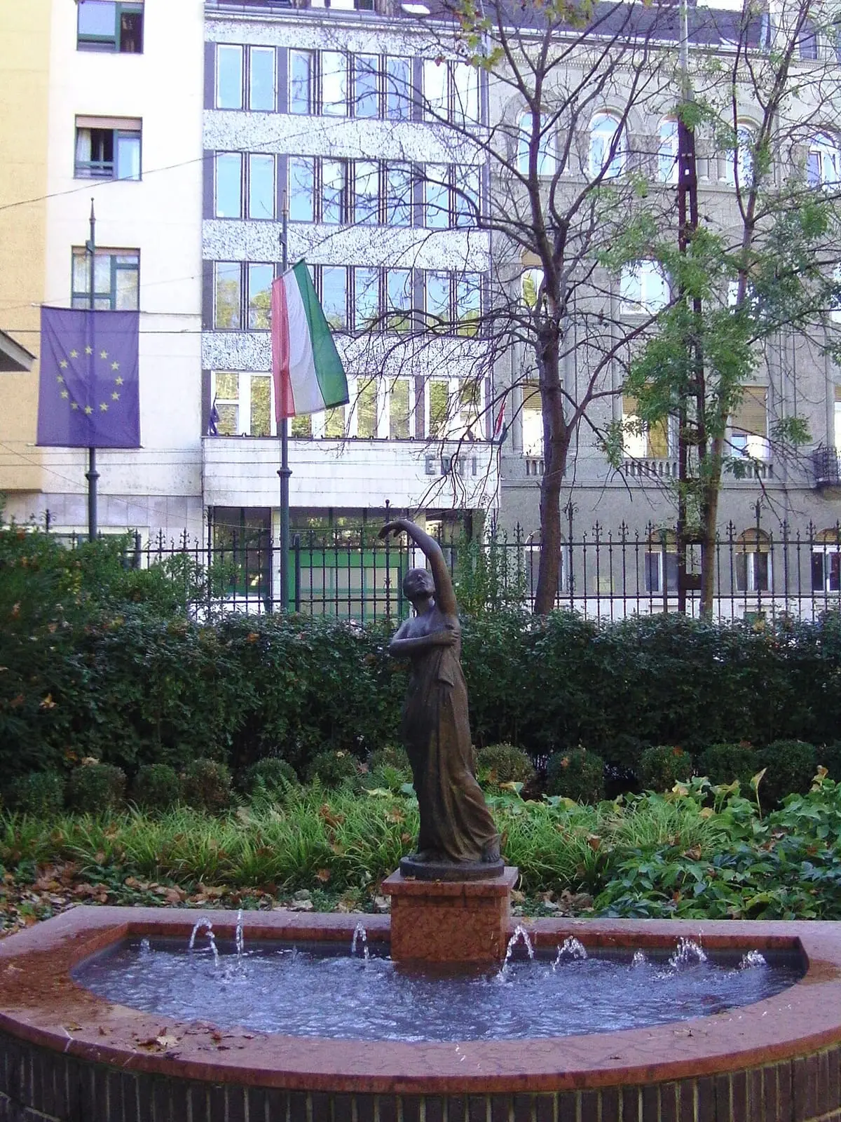 Bronze statue above a small fountain basin in the garden of Lukács Thermal Bath