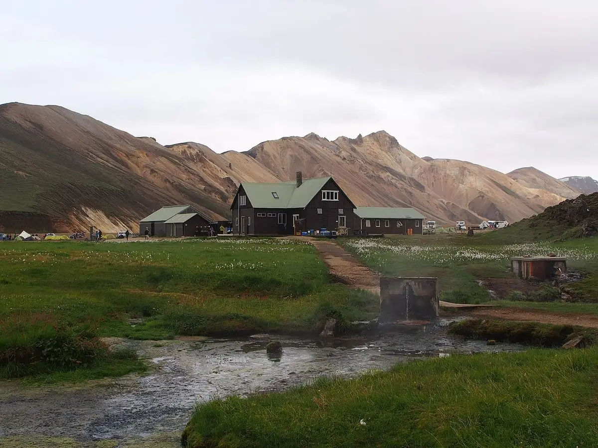 Landmannalaugar hut beside the warm stream with rhyolite mountains behind