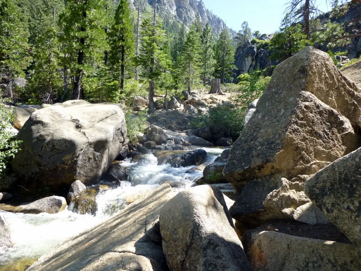 Creek tumbling between granite boulders on the Burnside Trail in Grover Hot Springs State Park