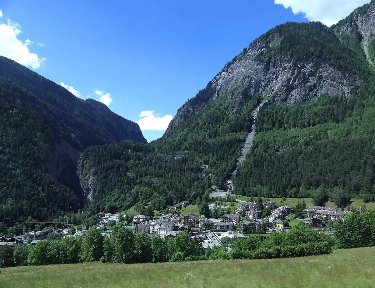 Pré Saint Didier village at the foot of wooded mountains in the Aosta Valley