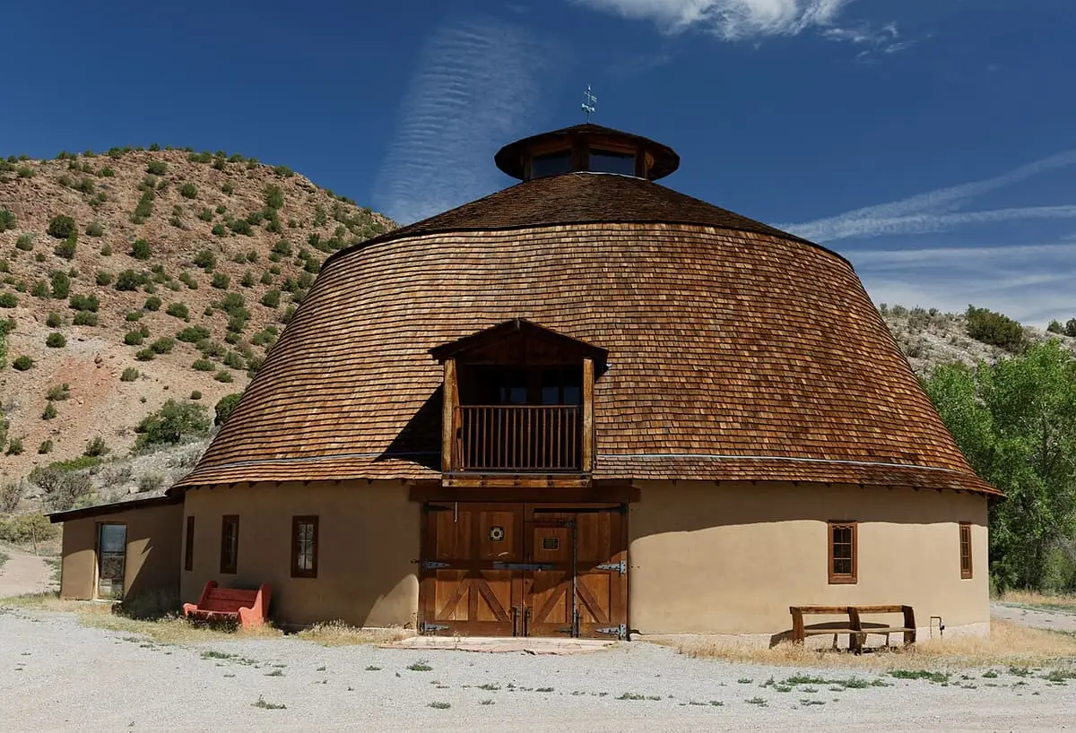 Historic round barn with a shingled dome roof at Ojo Caliente Hot Springs