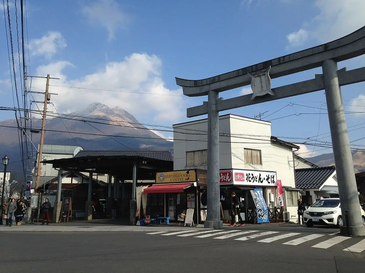 Grand torii of Unaguhime Shrine in Yufuin with Mount Yufu behind