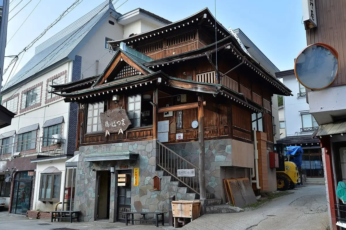 Traditional wooden Matsuba no Yu bathhouse in Nozawa Onsen village