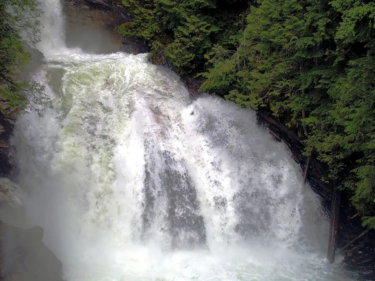 Close view of Crazy Creek Falls pouring white water over a rock ledge
