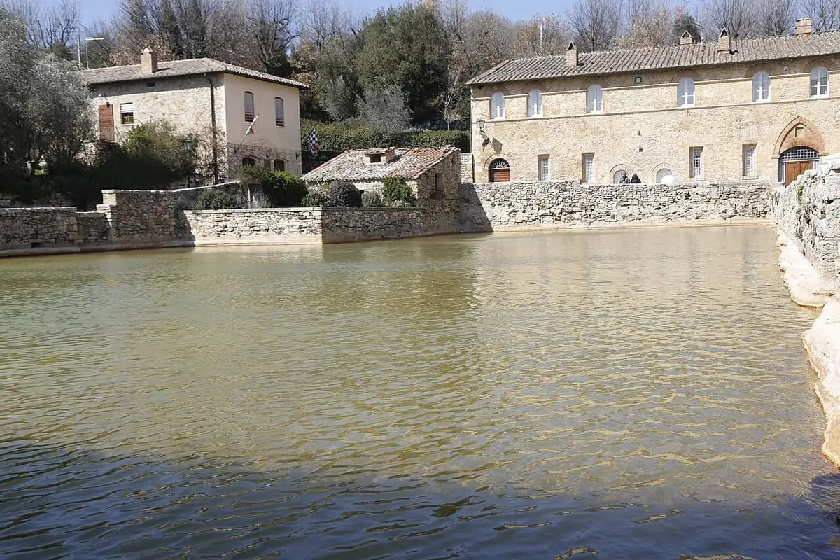 The large thermal pool in the piazza of Bagno Vignoni, source of the runoff below