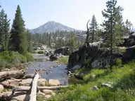 Mono Creek flowing past granite boulders and lodgepole pines at Mono Hot Springs