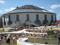 Domed bath hall with outdoor thermal pool at the Tiszaújváros thermal and beach bath
