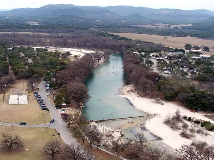 The Frio River winding through Garner State Park seen from Old Baldy with hills beyond