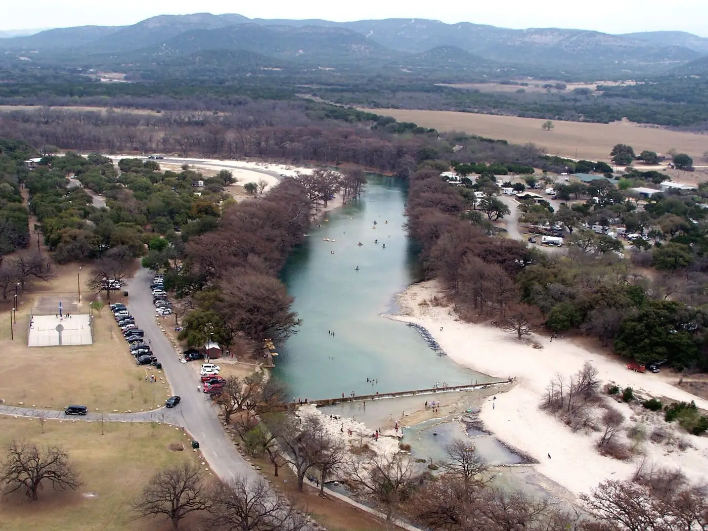 The Frio River winding through Garner State Park seen from Old Baldy with hills beyond