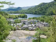 Okunikko Yumoto Onsen village and its steaming source field at the head of Lake Yunoko
