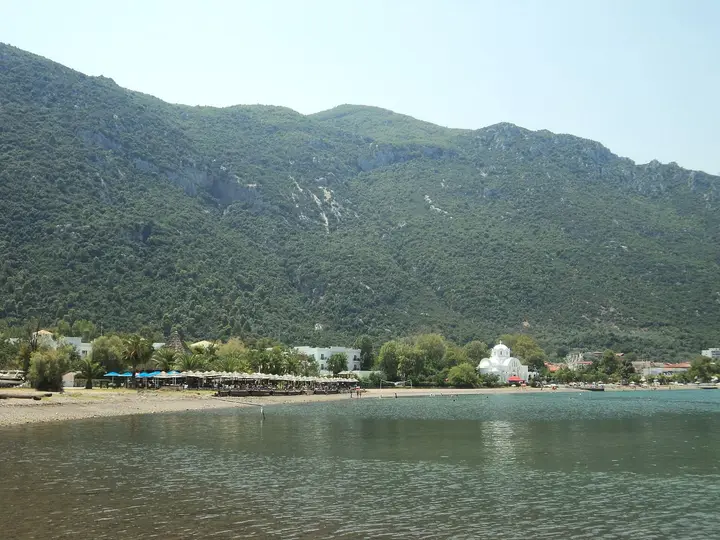 Kamena Vourla bay with the town below steep green mountains