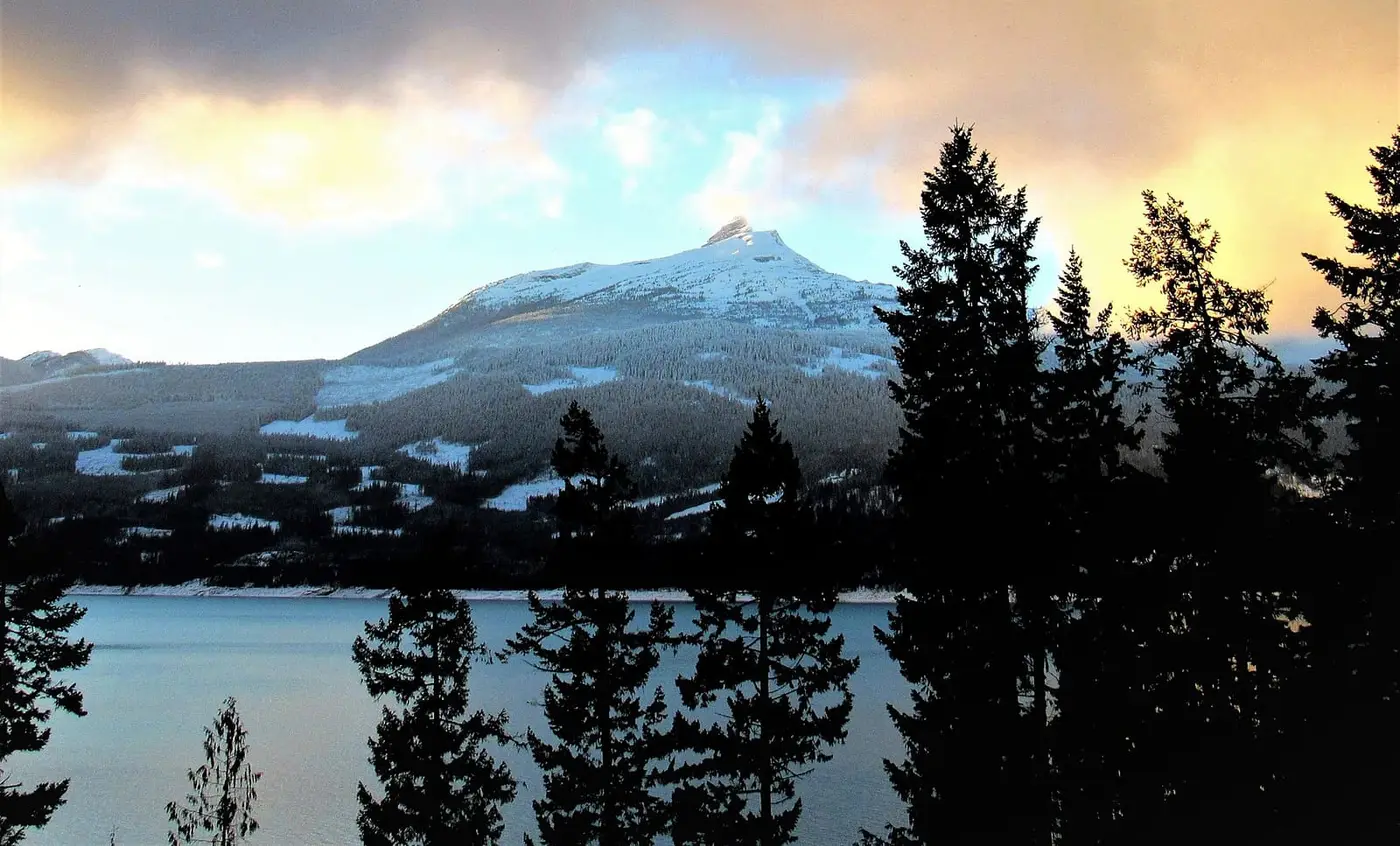 Snowy Mount Burnham across Upper Arrow Lake, seen from Halcyon Hot Springs Resort