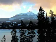 Snowy Mount Burnham across Upper Arrow Lake, seen from Halcyon Hot Springs Resort