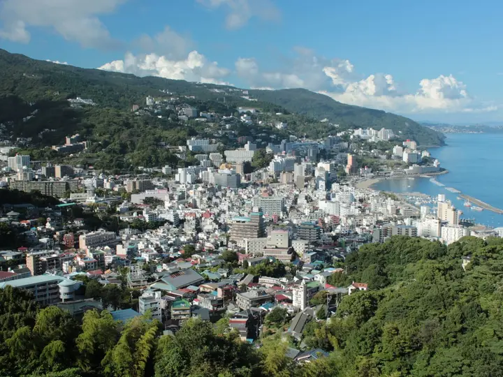Hillside view over downtown Atami and its hot spring hotels along the blue Sagami Bay coast