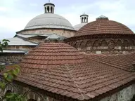 Tiled domes and lantern roofs of the Eski Kaplıca Ottoman bathhouse in Çekirge, Bursa