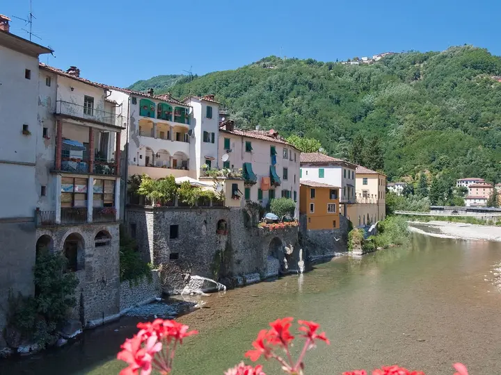 Lima river flowing past the riverside houses of Ponte a Serraglio in Bagni di Lucca